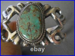 M CAYATINETO Native American Navajo Turquoise Sterling Silver Sand Cast Bracelet