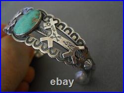 Native American Navajo Turquoise Sterling Silver Stamps /Dog Repousse Bracelet