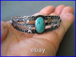 Native American Navajo Turquoise Sterling Silver Stamps /Dog Repousse Bracelet