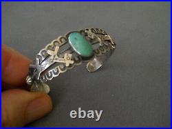 Native American Navajo Turquoise Sterling Silver Stamps /Dog Repousse Bracelet