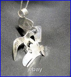 Northwest native American silver Eagle Salmon pendant Indigenous art jewelry